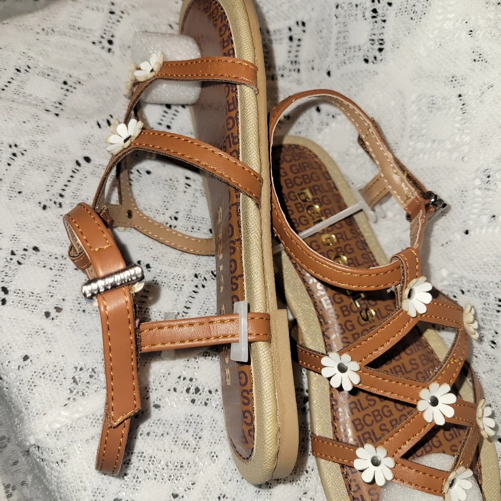 BCBG Girls Brown Sandals with White Floral Accents. New In Box